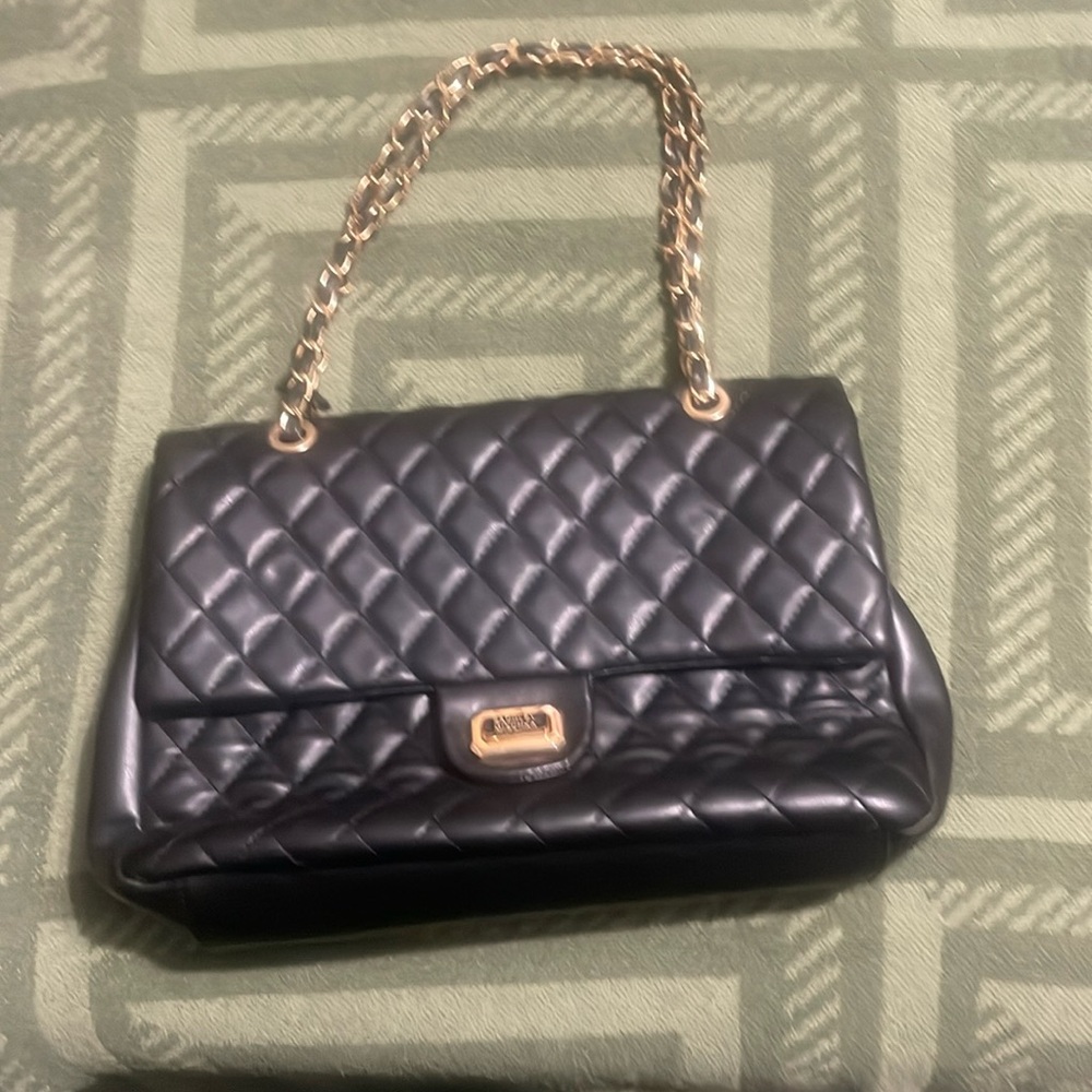 Channel style purse 12inch width by7 inch  very clean good condition